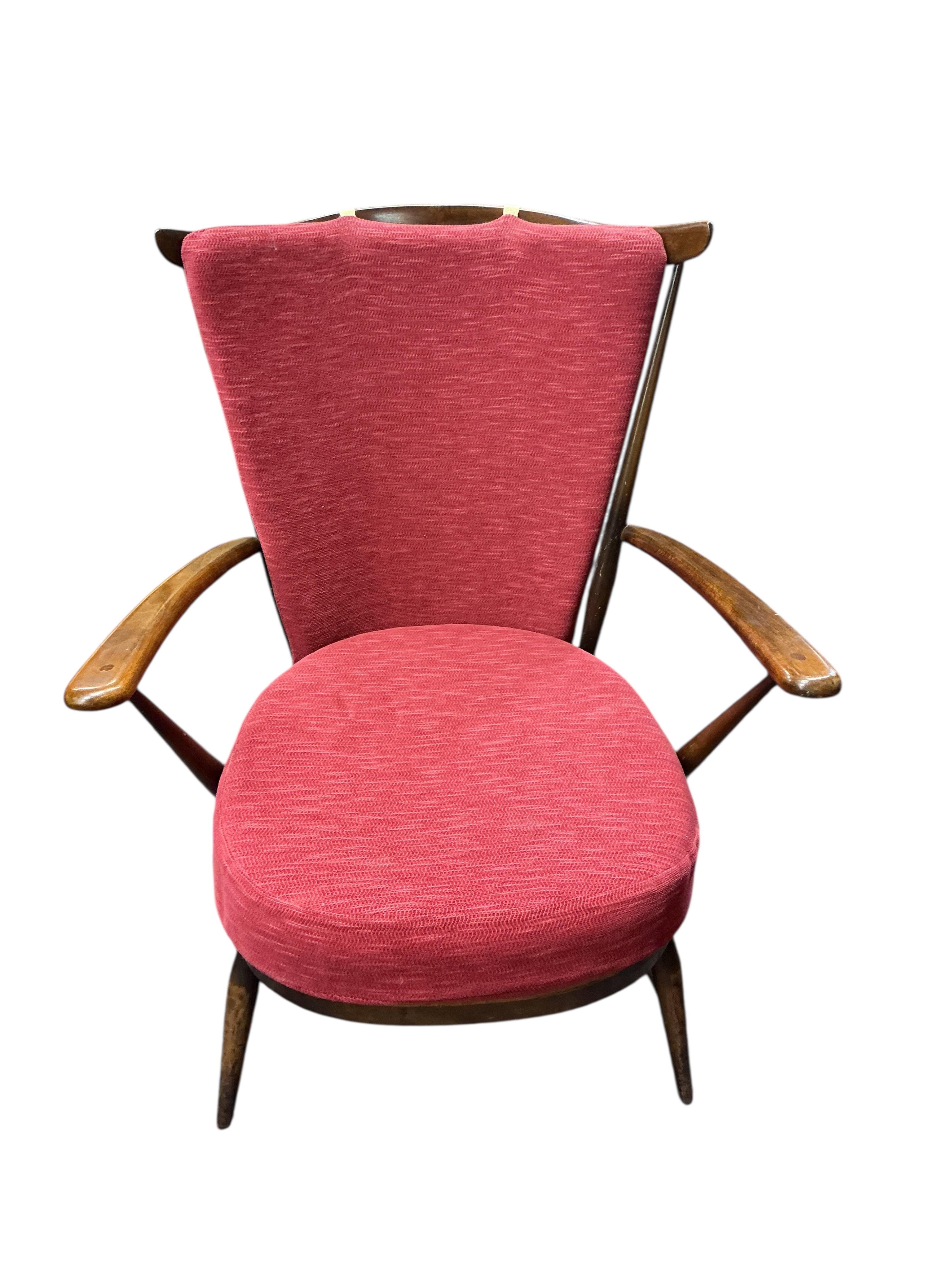 A pair of Ercol armchairs, width 70cm, depth 60cm, height 86cm